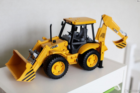 Машина Экскаватор-погрузчик колёсный JCB 4CX