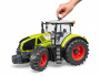 Трактор Claas Axion 950 c цепями и снегоочистителем